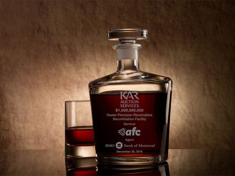 An etched decanter is a great business gift.
